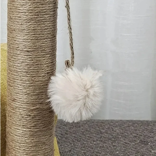Rouleau en tissu pastel pour le jeu des chats